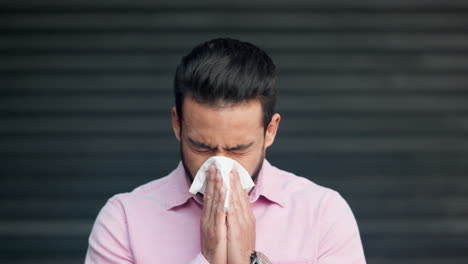 Sick,-allergic-and-sneezing-young-man