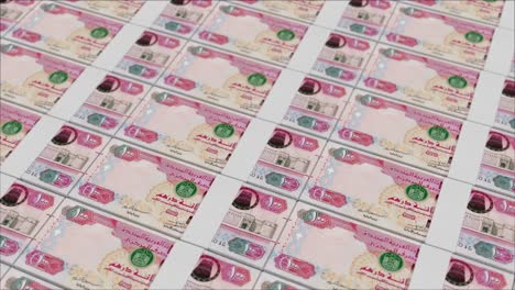100-UNITED-ARAB-EMIRATES-DIRHAM-banknotes-printed-by-a-money-press
