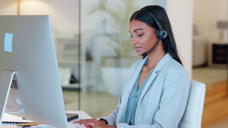 Female-call-center-agent-typing-an-email