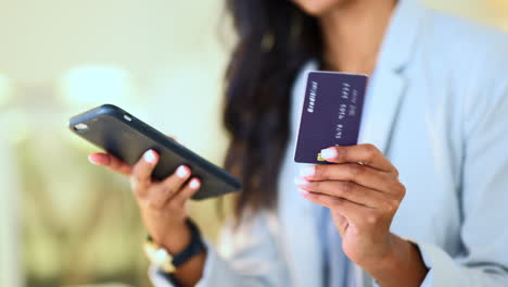 Bank-card-data-put-in-phone-by-a-woman-doing