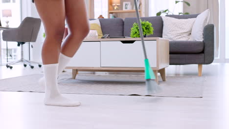 Cheerful,-fun-and-happy-cleaning-female-legs