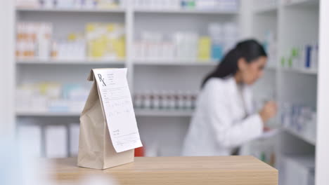 Pharmacy,-medicine-and-paper-bag-with-pharmacist