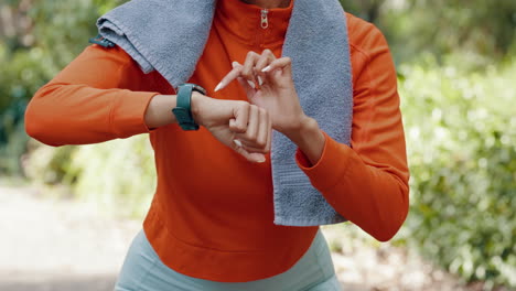Woman-sports-runner-with-smartwatch-for-exercise