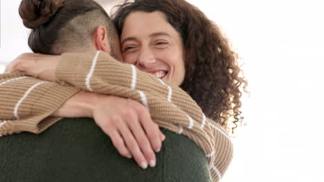 Couple-hug,-woman-welcome-man-in-home