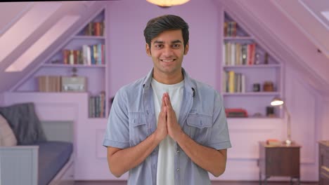 Cute-Indian-boy-doing-Namaste-and-greetings