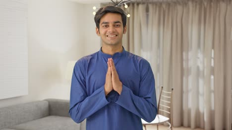 Cute-Indian-boy-doing-Namaste