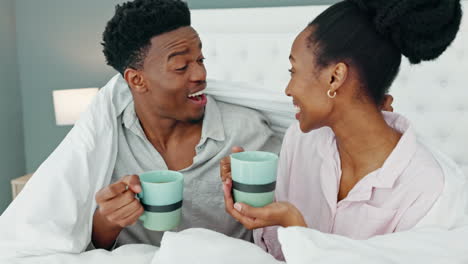 Bed,-morning-and-couple-together-with-mug