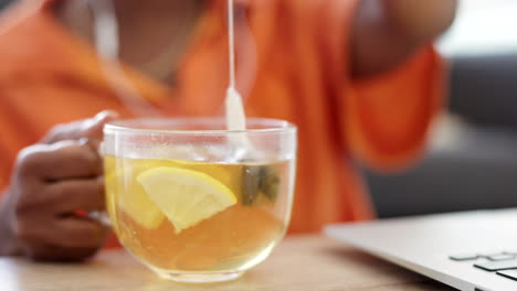 Calm-woman-with-green-tea-with-lemon-for-health