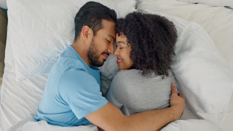 Love,-wake-up-and-hug-with-couple-in-bed-together