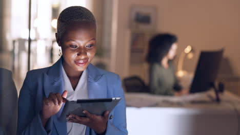 Business,-night-and-black-woman-working-on-tablet