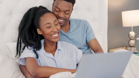 Computer,-video-and-streaming-of-a-black-couple