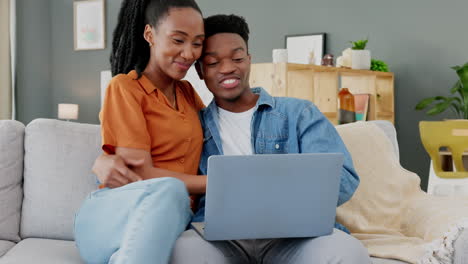 Black-couple,-laptop-and-streaming-service