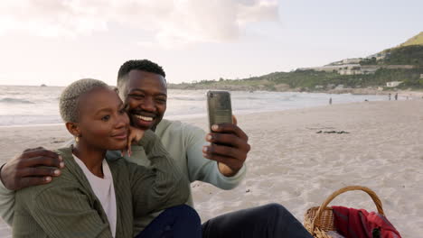 Selfie,-black-couple-and-love-during-a-beach
