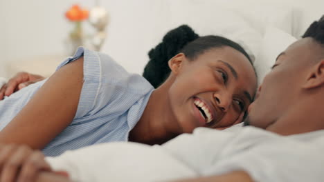 Happy-black-couple-embrace-and-bonding-in-bed