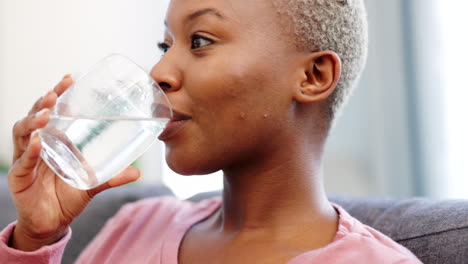 Glass-of-water,-hydrate-and-happy-drinking-woman