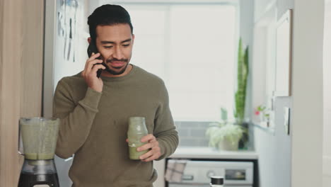 Phone,-smoothie-and-health-with-a-man-drinking