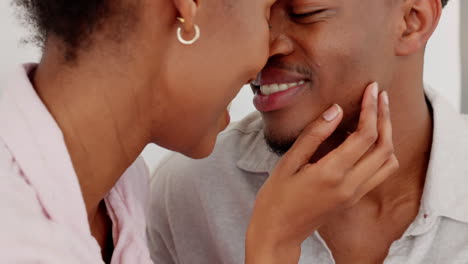 Love,-African-couple-and-kiss-with-smile-in-happy