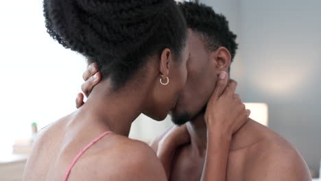 Black-couple-kiss-on-bed-in-bedroom-in-home
