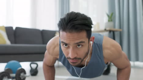 Man-doing-exercise-for-fitness-workout-with-music