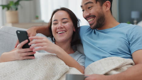 Relax,-sofa-and-couple-with-a-smartphone-talking