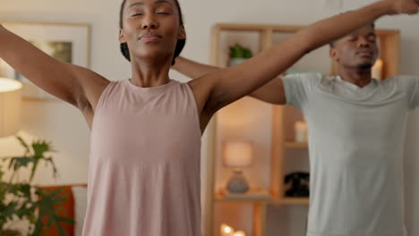A-healthy-black-couple-doing-yoga
