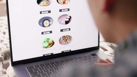Website,-internet-and-food-delivery-with-laptop