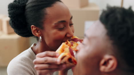 Couple,-pizza-and-eating-in-new-home