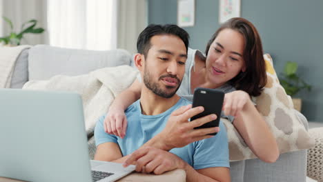 Asian-couple,-phone-and-laptop-for-finance