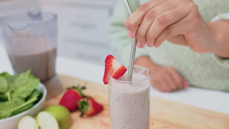 Health,-kitchen-and-woman-with-smoothie-drink