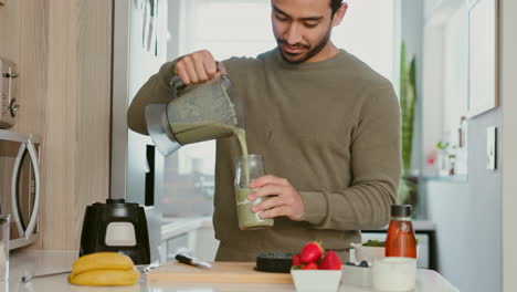 Asian-man,-fruit-smoothie-and-green-juice-as