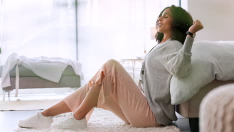 Relax,-happy-and-stretching-woman-sitting-at-home