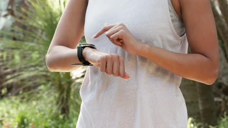Runner-training-with-smartwatch-in-nature