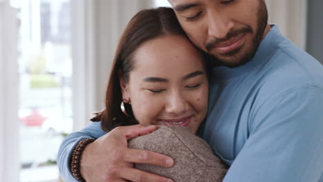 Couple-giving-love-hug-in-home