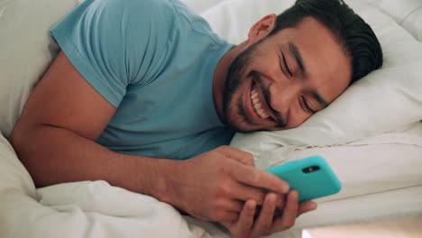 Relax,-bed-and-man-typing-with-phone