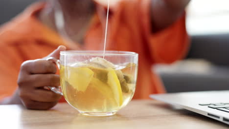 Lemon-tea,-hot-beverage-and-freelance-woman