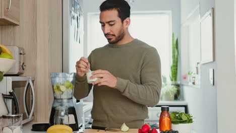 Fruit,-blender-and-smoothie-with-man-in-kitchen