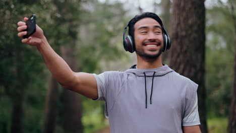 Phone,-exercise-and-man-in-forest-selfie-record