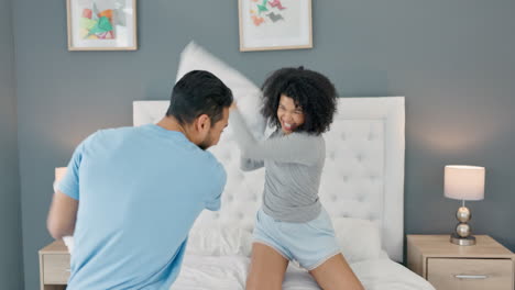 Love,-pillow-fight-and-couple-with-a-man