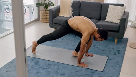 Asian-man-does-yoga-exercise-from-home