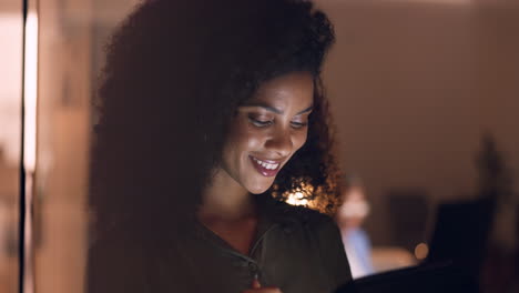 Office,-night-and-happy-black-woman-on-a-tablet