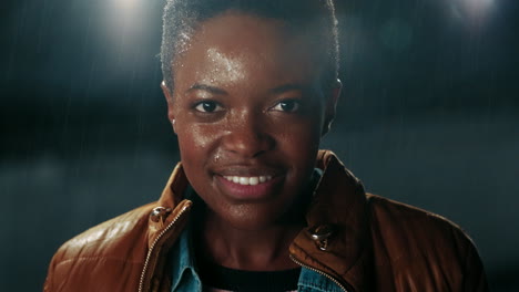 Black-woman,-happy-and-rain-with-water-on-face