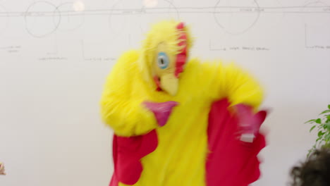 Employee-in-chicken-suit,-dancing-funny-meme