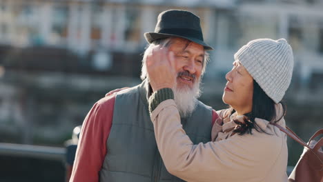 Love,-travel-and-senior-couple-from-Japan-hug