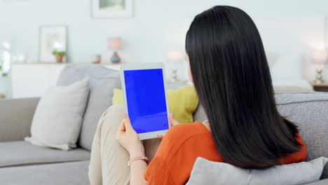Tablet-mockup,-sofa-woman-and-green-screen
