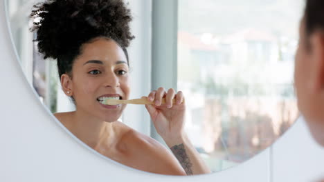 Black-woman,-mirror-and-brushing-teeth-for-clean