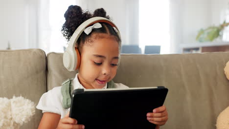 Tablet,-headphones-and-child-with-e-learning-app