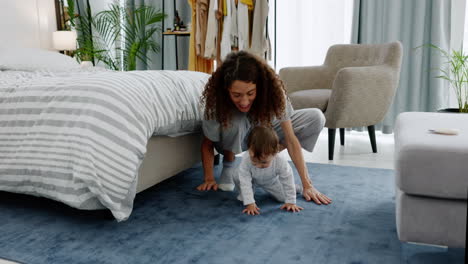 Learning,-mother-and-teaching-baby-to-crawl