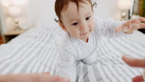 Baby,-crawling-and-bed-with-help-from-parent-pov