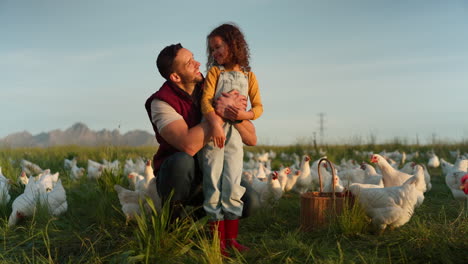 Man-with-girl,-happy-chicken-farmer