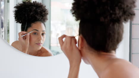 Mirror,-makeup-and-black-woman-shape-eyebrows